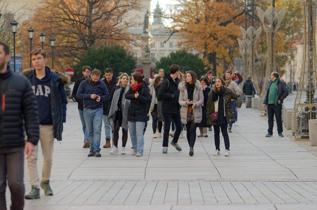 people, men, ladies, boys, groups, going, walk, nature, the street, the sidewalk, trees, urban, town